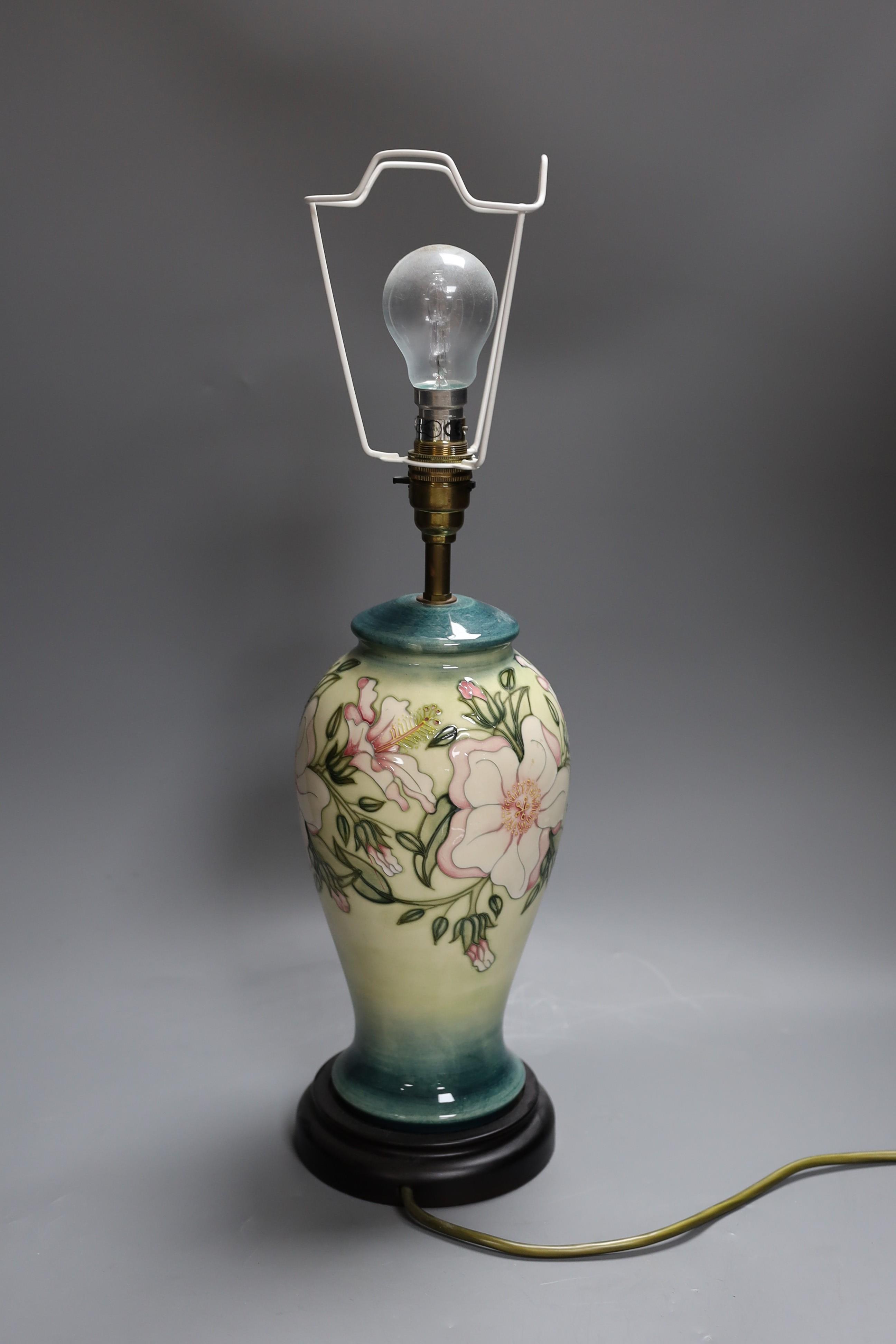 A Moorcroft vase lamp with floral decoration, 38cm tall excl. bulb